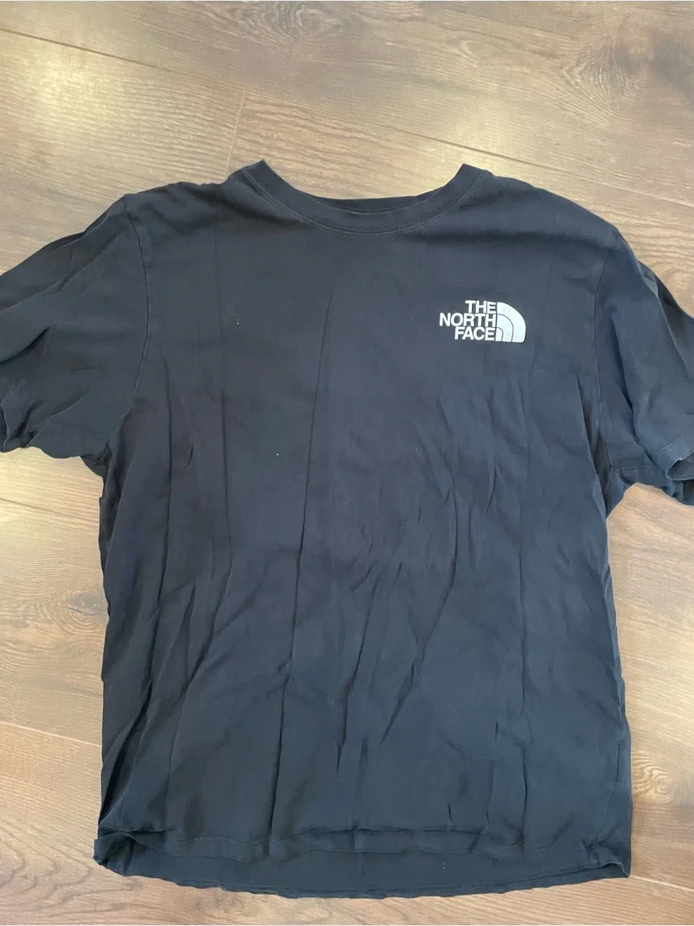 The North Face Black Graphic Tee - 'Never Stop Exploring'
